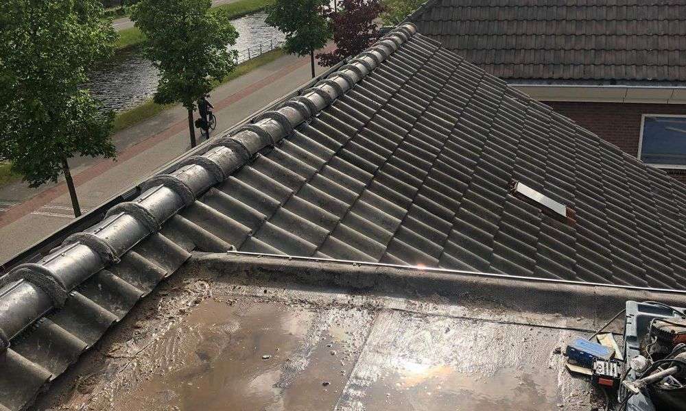 Lekkage op plat dak in Haarlem
